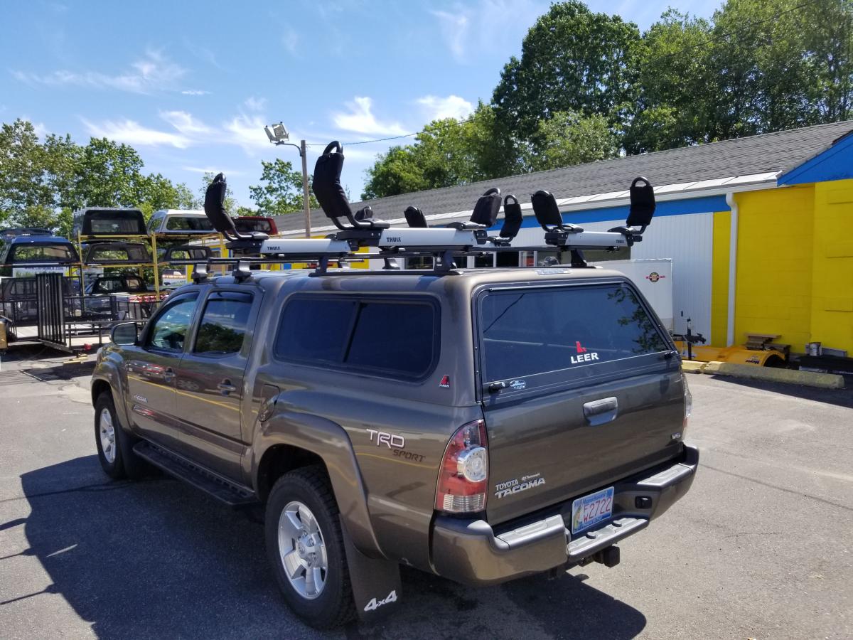 Thule tracker ii best sale roof rack system leer